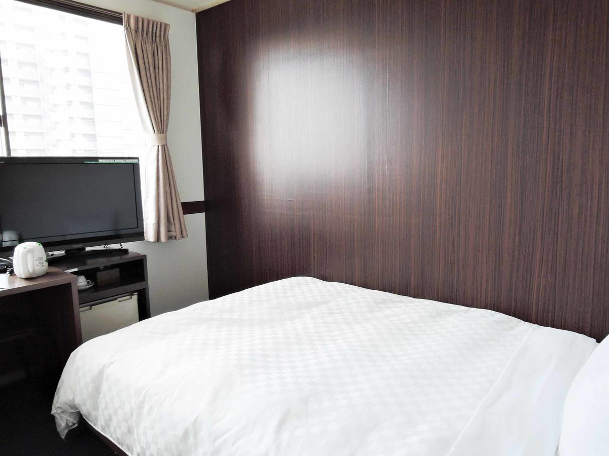 Tosu Hotel Komatsusou Buitenkant foto