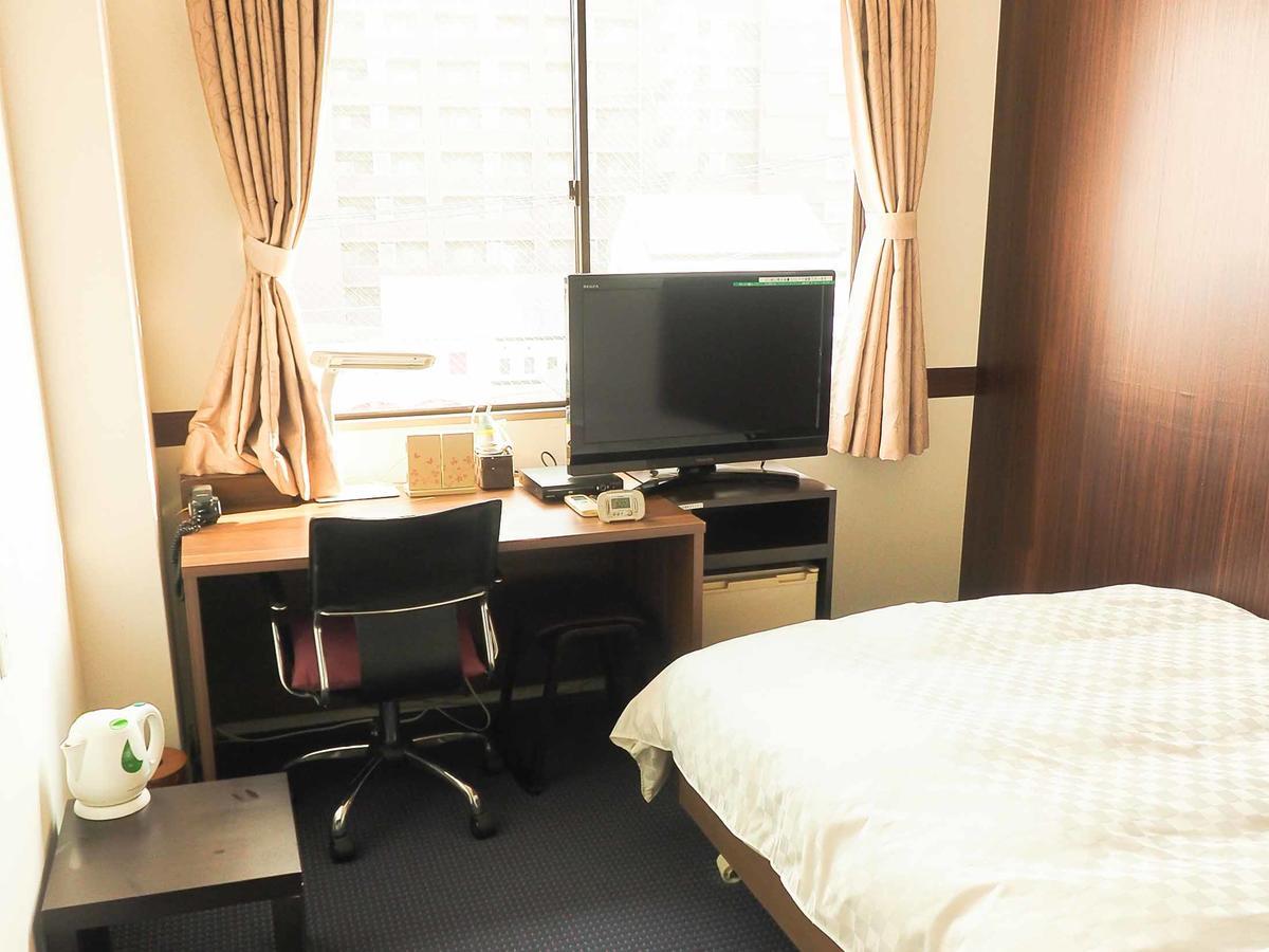 Tosu Hotel Komatsusou Buitenkant foto