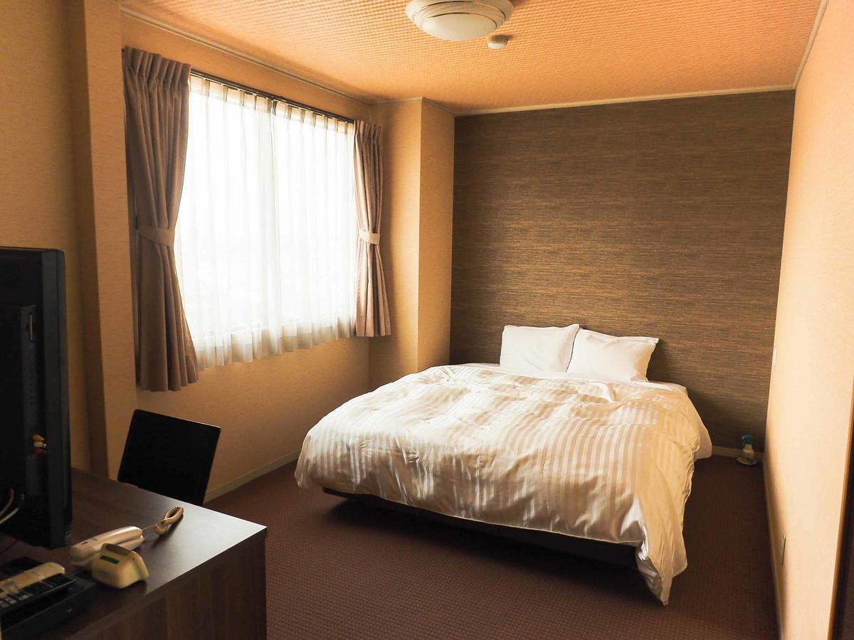 Tosu Hotel Komatsusou Buitenkant foto