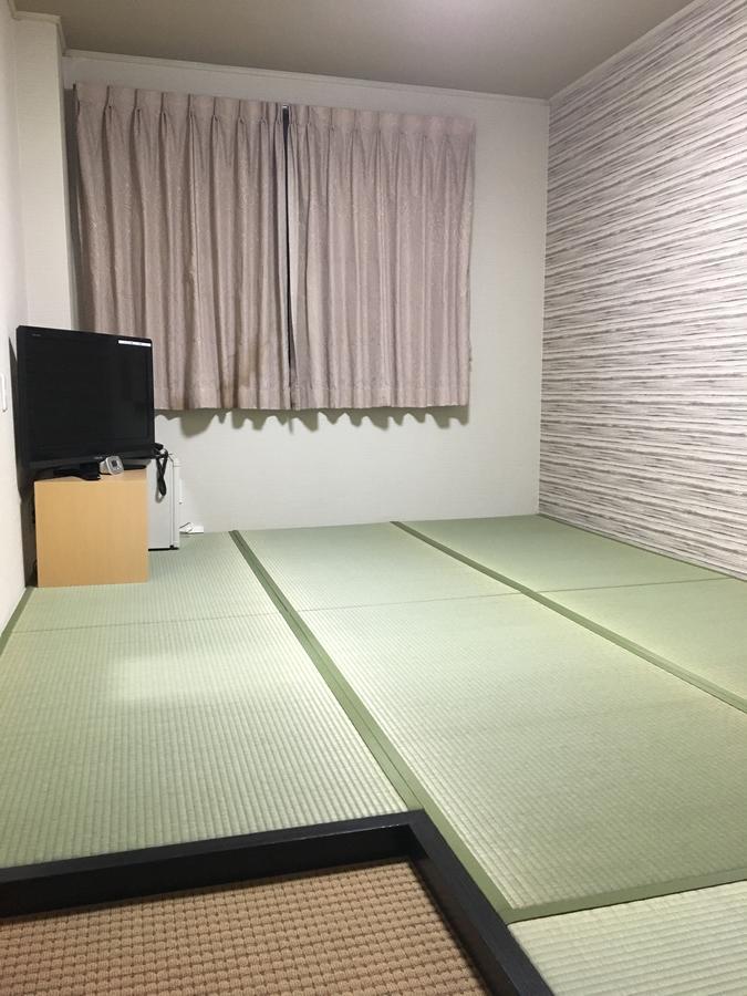 Tosu Hotel Komatsusou Buitenkant foto